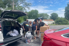 Susan-Hendin-Randy-Schenberg-and-husband-with-agency-reps-unloading-cars
