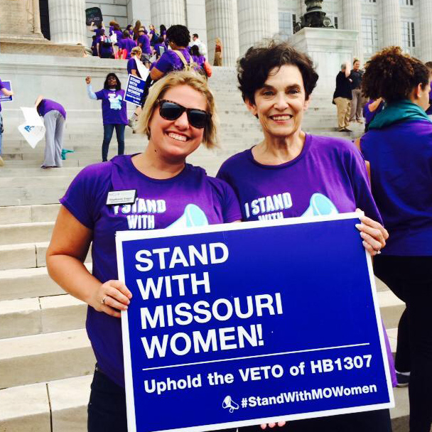 Nancy Litz at rally, holding sign reading "Stand with Missouri Women! Uphold the VETO of HB1307 #StandWithMoWomen"